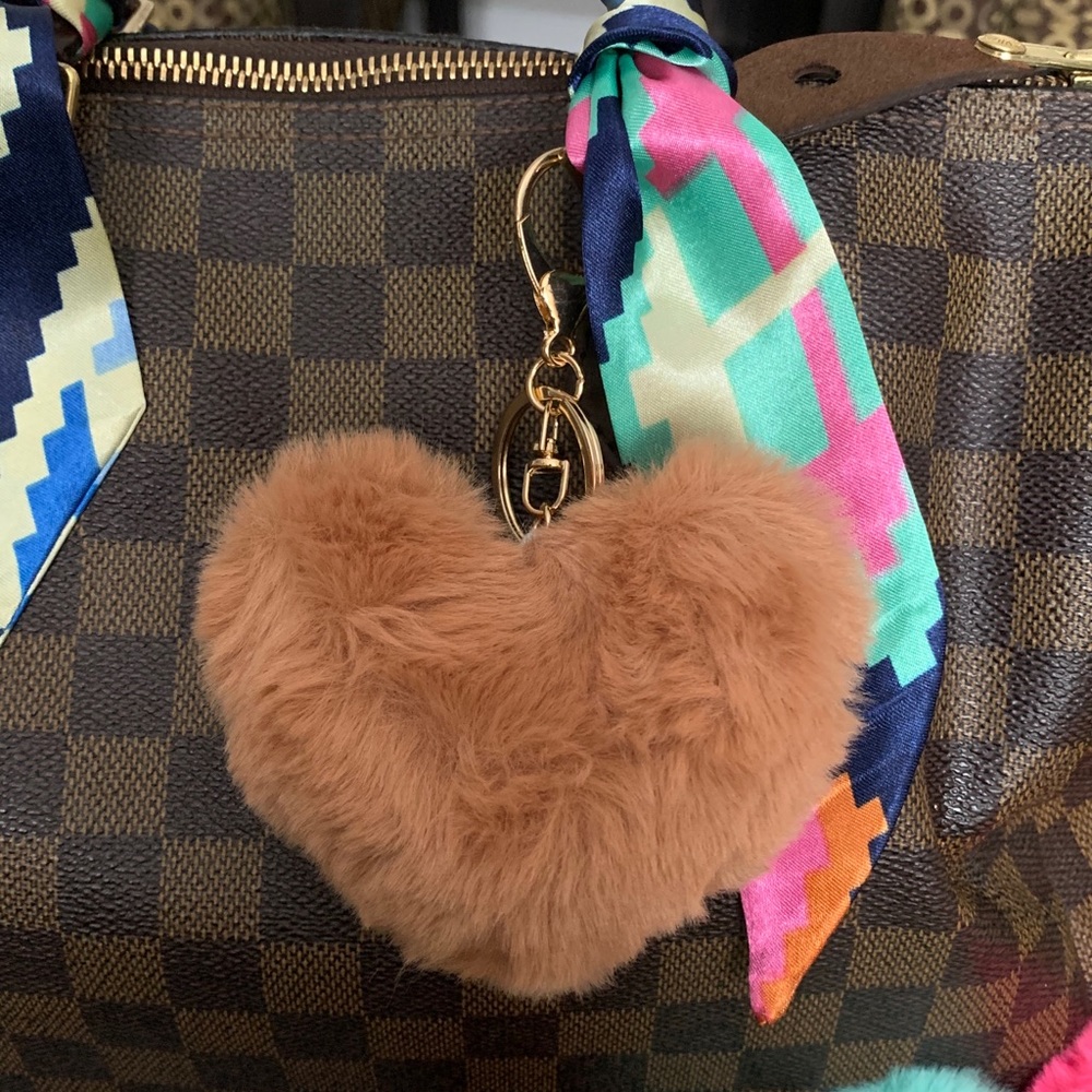 Tan heart charm 🤎